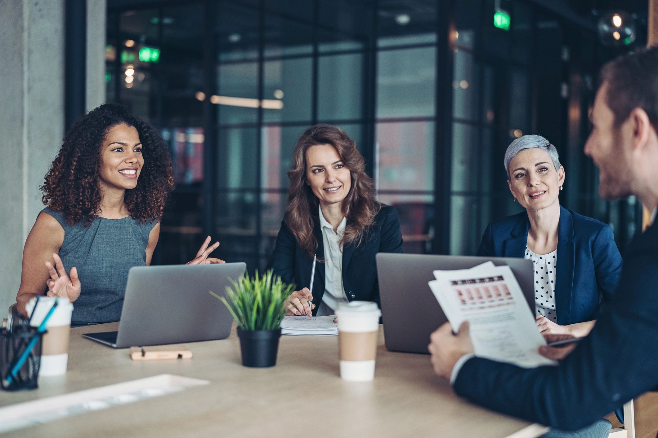Recruitment professionals meeting around a conference table