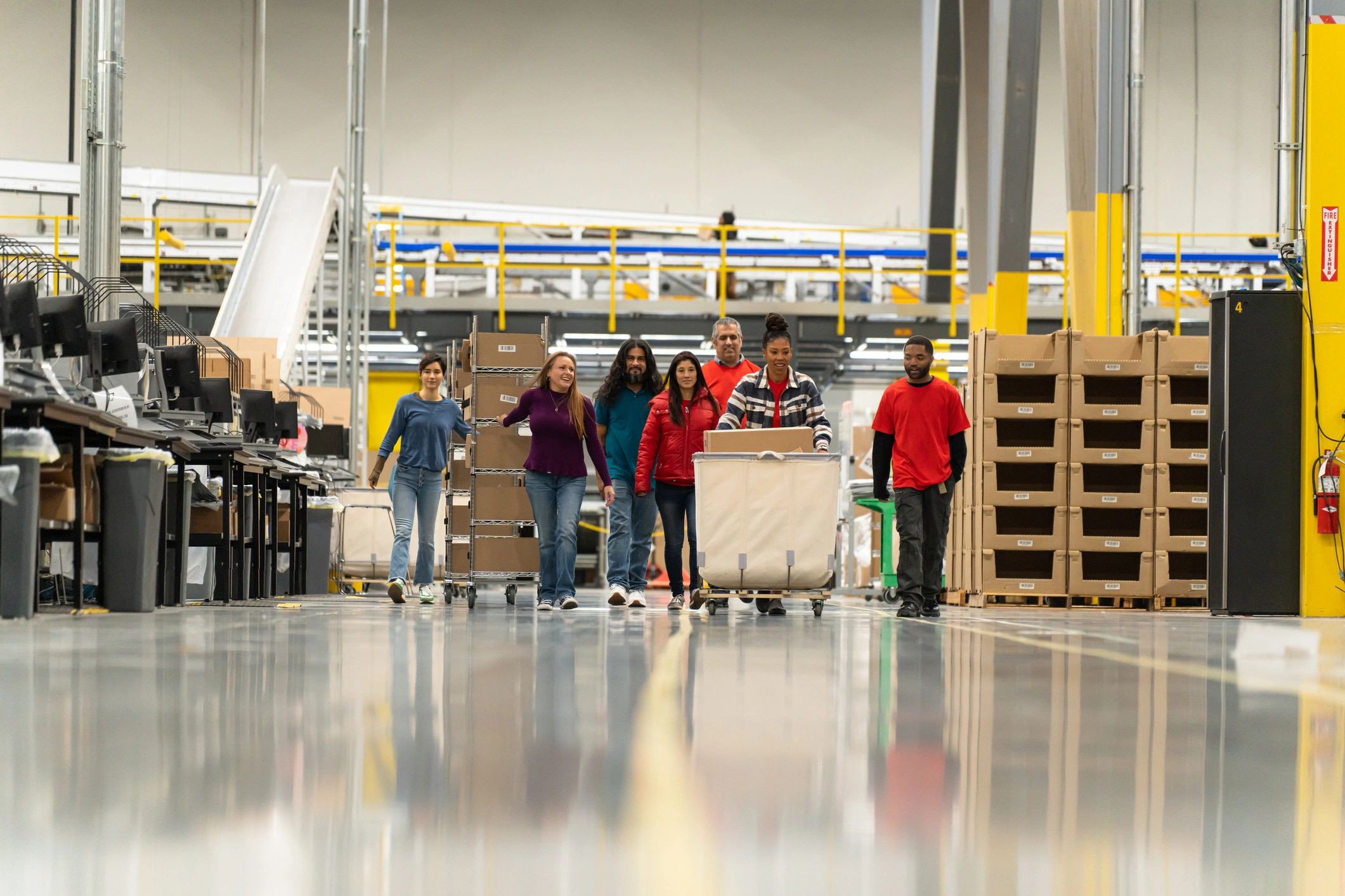 Warehouse team walking through a fulfillment center