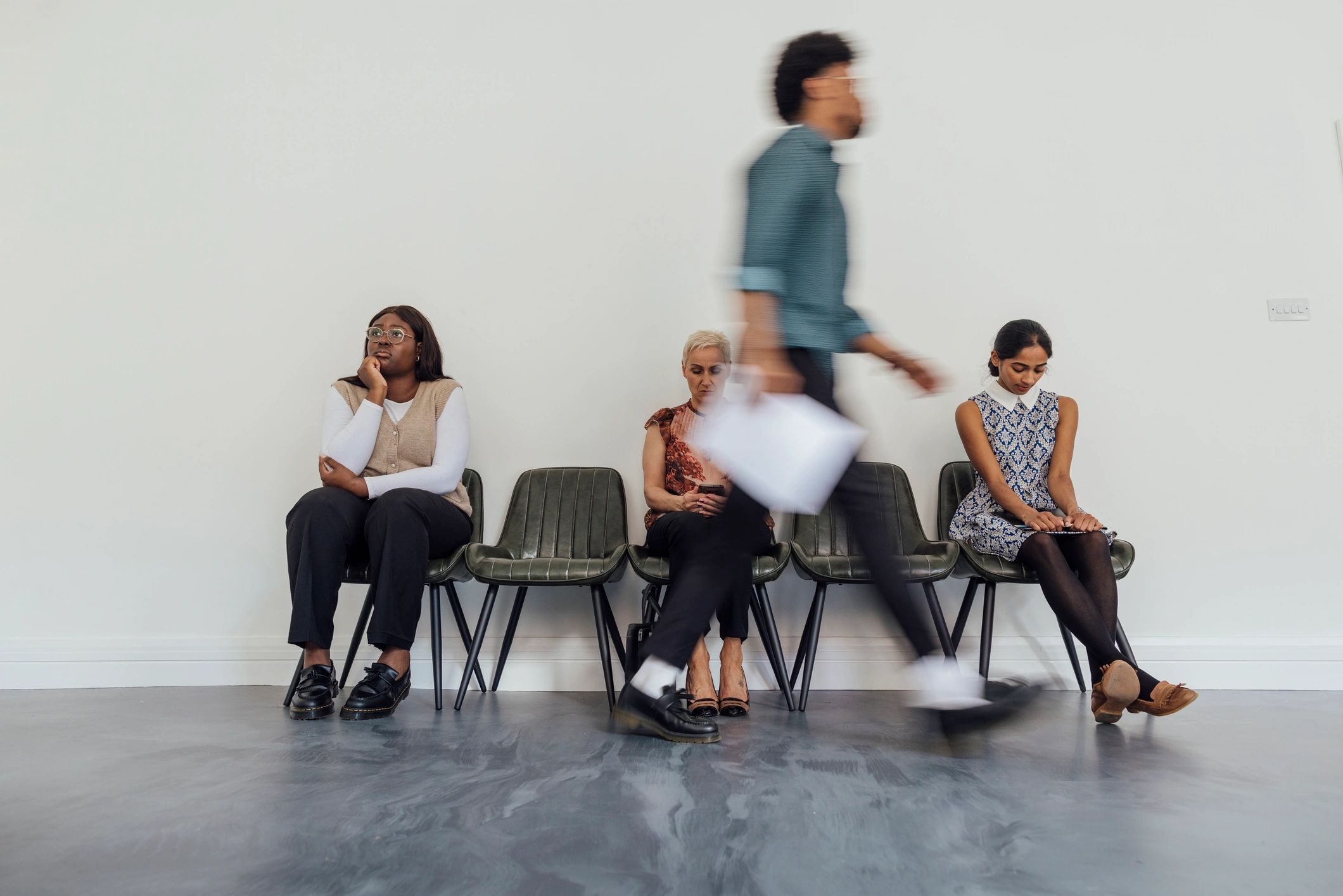 Professionals preparing for a business meeting