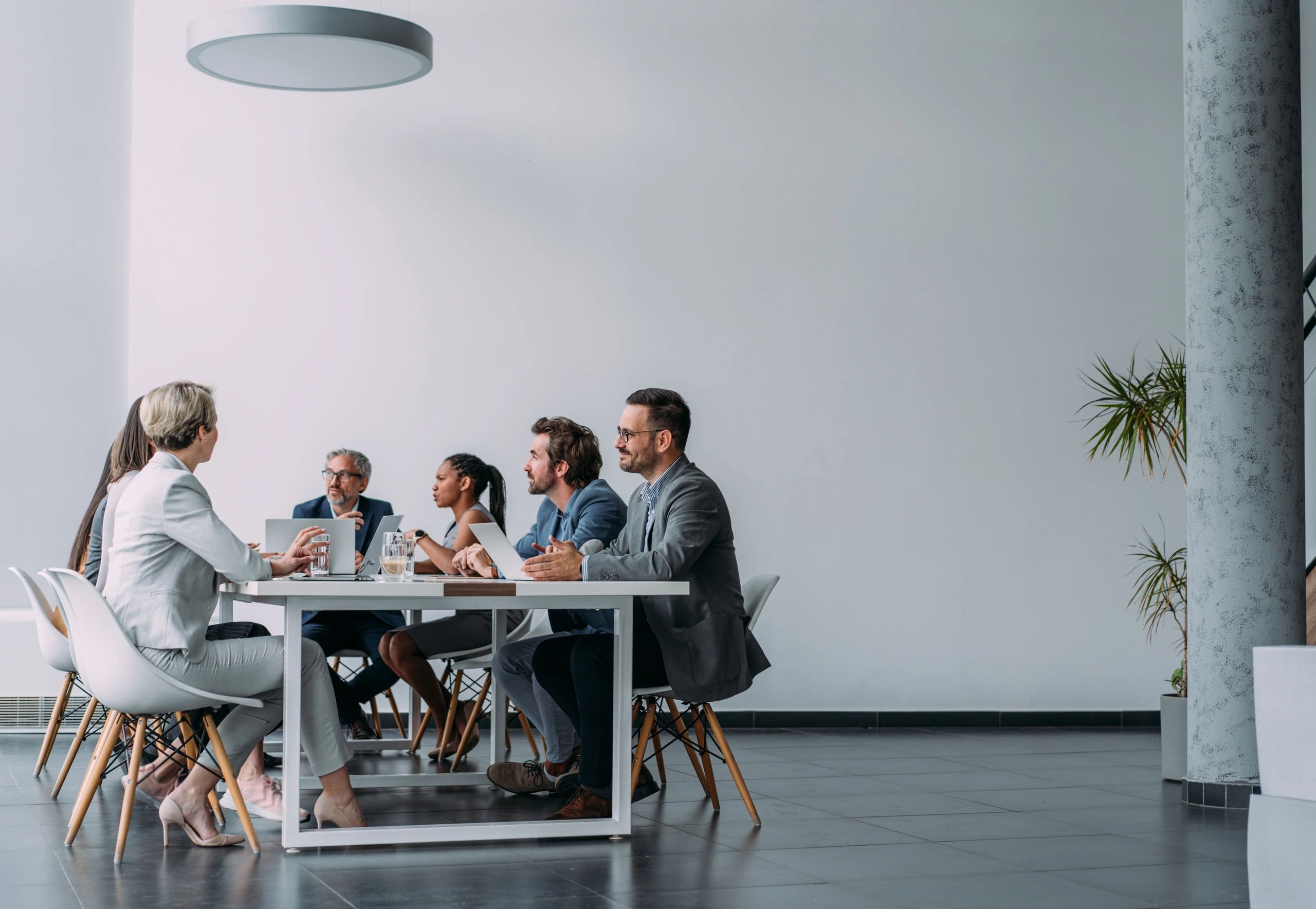 Corporate partners reviewing our B2B recruitment terms of business
