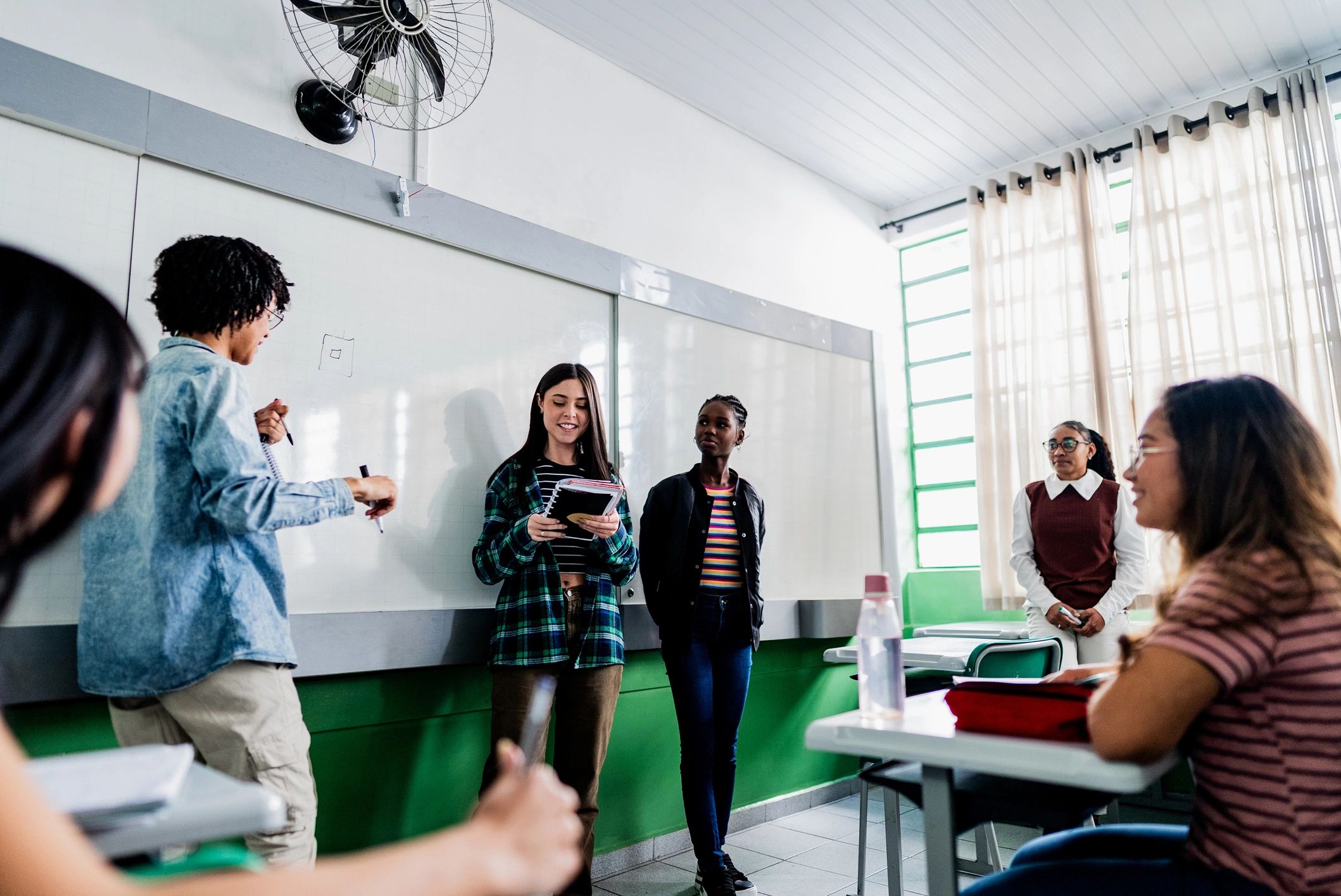 Workforce training session with learners presenting in a classroom