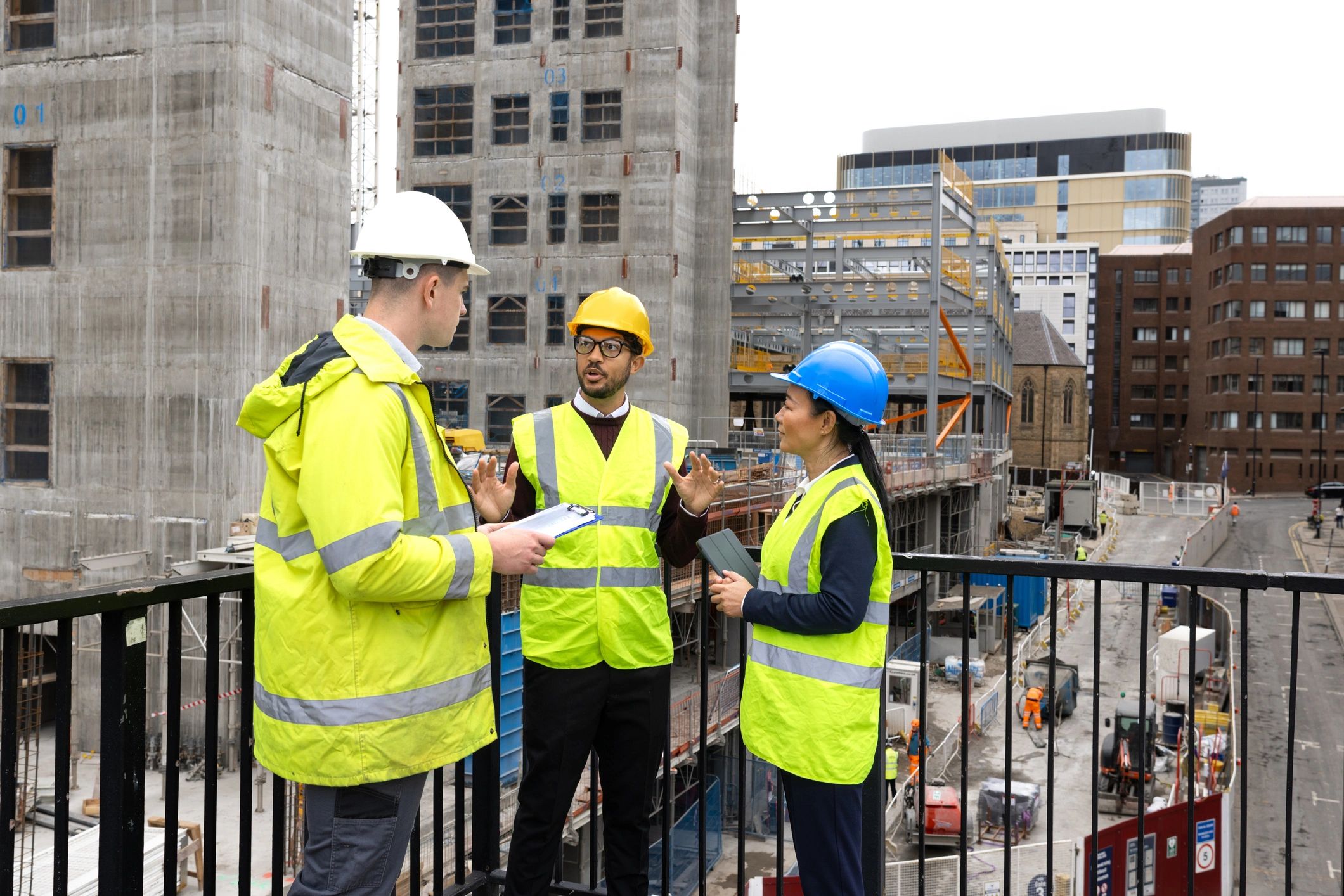 Construction workforce collaborating on site